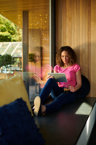 watching the tablet on a coffee break