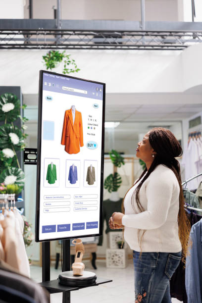 istock Shopper choosing clothes on display 1490563970