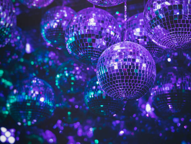 istock Disco Balls purple blue light Party Bar Nightlife 1490564088