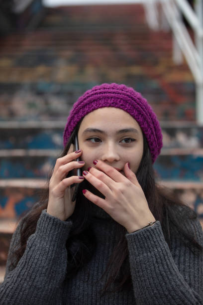 istock Young girl is taking on the mobile phone. 1490564213
