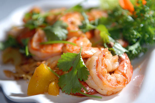 istock The big tiger shrimps with vegetables and nuts 149056433