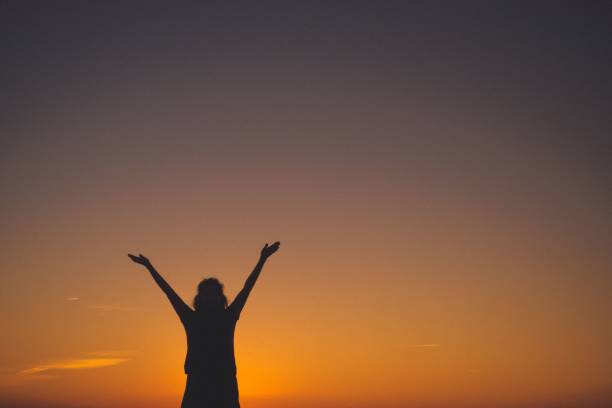 istock silhuette of a woman during sunset 1490566284