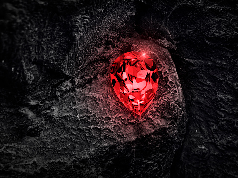 Red diamond on black coal background