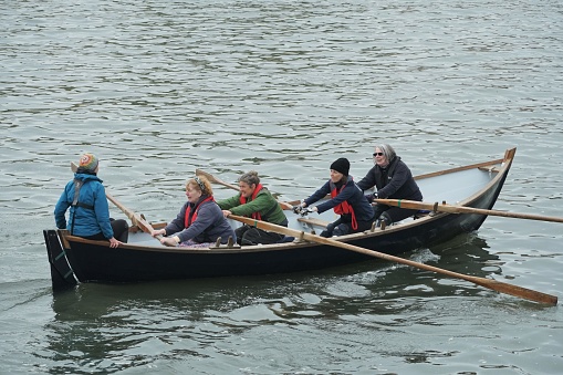 Port Seton,  East Lothian Scotland - 6 May 2023: One of the senior ladies teams taking part in a coastal rowing regatta at Port Seton.