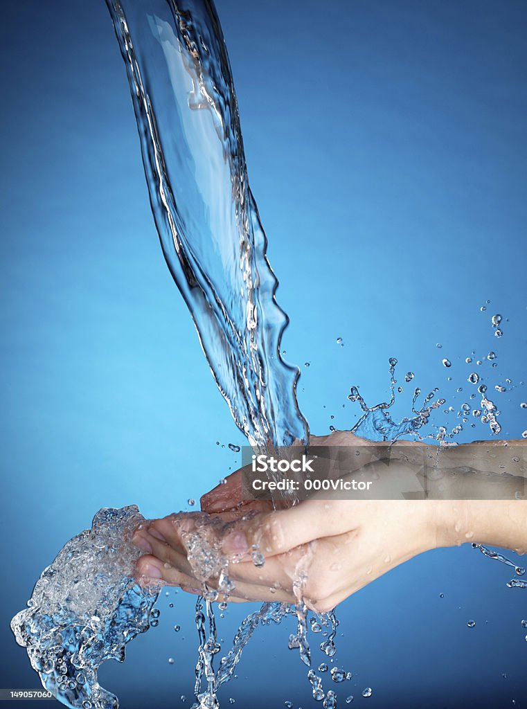 Hands and stream of water. Hands and stream of water. Very high resolution. Adult Stock Photo