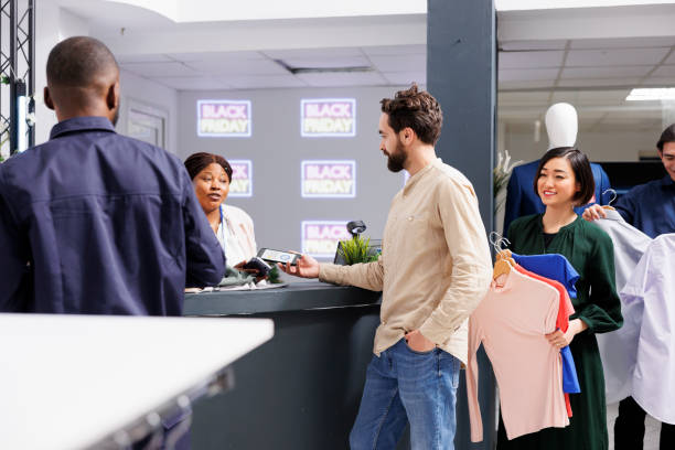 istock Young man buying clothes on Black Friday 1490570813