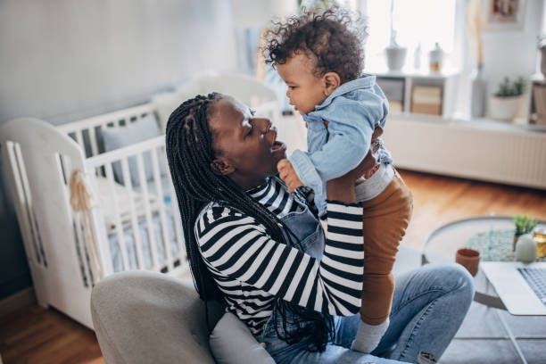 istock Happy mom with baby boy 1490572545