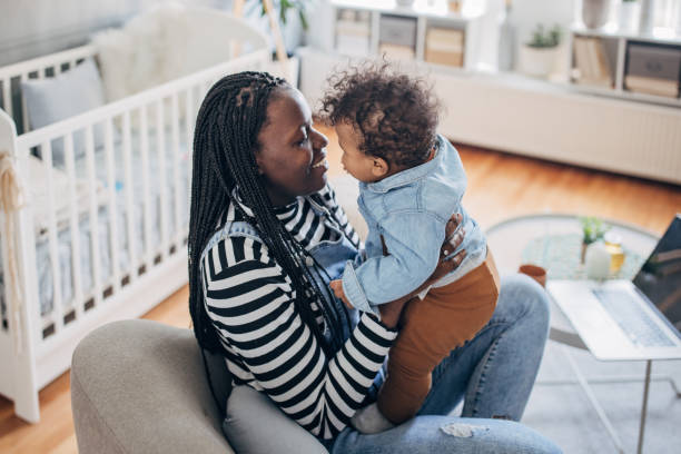 istock Happy mom with baby boy 1490572565