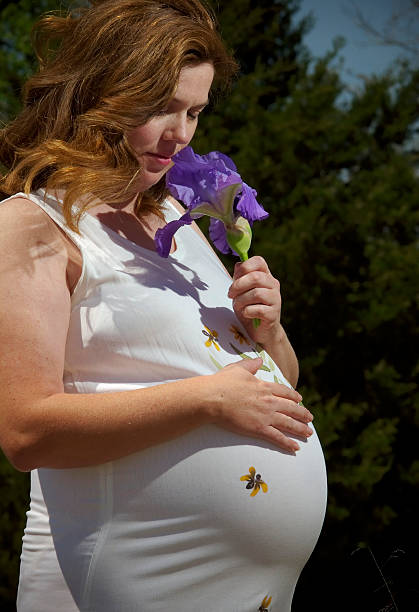 Pregnant with Iris stock photo