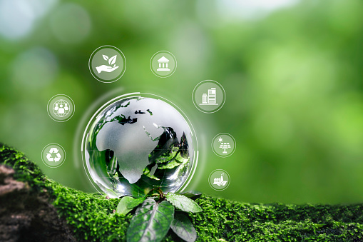 Globo de cristal con desarrollo sostenible e icono ESG para el medio ambiente social, la gobernanza y la cooperación empresarial para el concepto de gobernanza social del medio ambiente sostenible mundial. photo