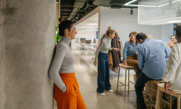 istock Colleagues taking a coffee break in the office cafeteria 1490576967