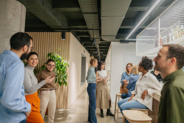 istock Colleagues taking a coffee break in the office cafeteria 1490577036