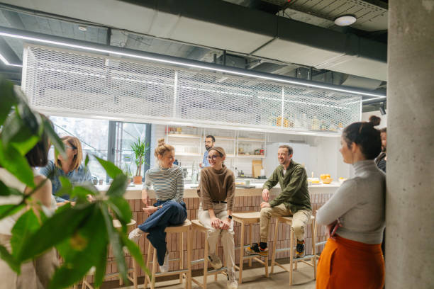 istock Colleagues taking a coffee break in the office cafeteria 1490577057