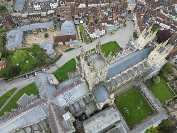 Aerial shot of Canterbury Cathedral, the iconic English cathedral located in Kent, England An aerial shot of Canterbury Cathedral, the iconic English cathedral located in Kent, England canterbury england stock pictures, royalty-free photos & images