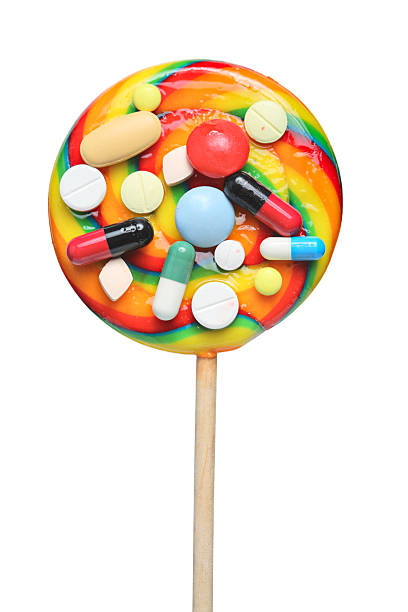 istock Pills stuck on a lollipop 149058424