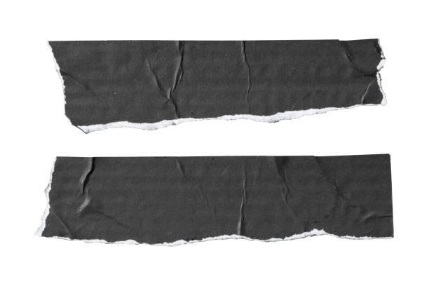 istock two pieces of torn black paper 1490584374