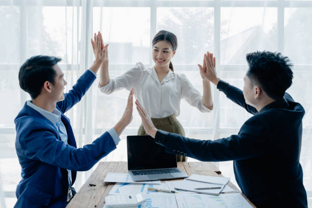 istock Give me five. managers employees join hands high celebrate common achievement. Two young men successful teammates friends greet each other with great job result 1490587849