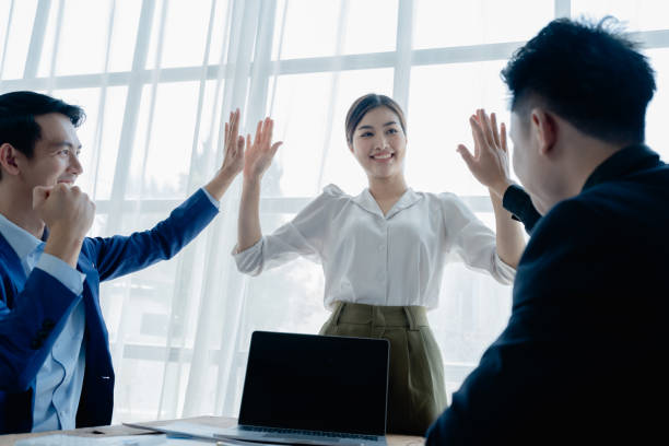 istock Give me five. managers employees join hands high celebrate common achievement. Two young men successful teammates friends greet each other with great job result 1490587904