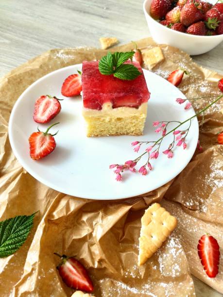 istock Homemade cheesecake with strawberries and red jelly. 1490592276