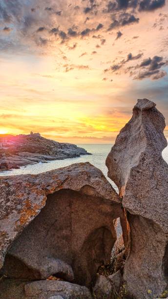 istock Scenic landscape with rock formations on the seashore at sunset 1490593201