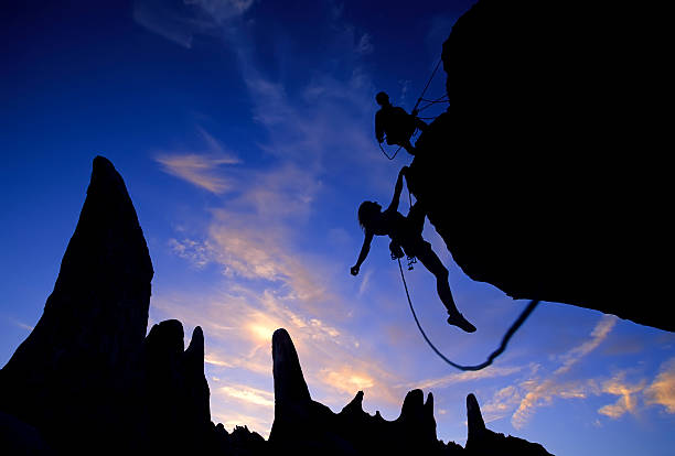 istock Team of climbers reaching the summit. 149059330
