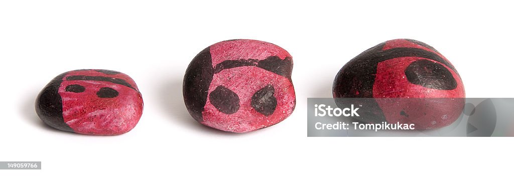 Dipinto coccinella rocks - Foto stock royalty-free di Ciottolo