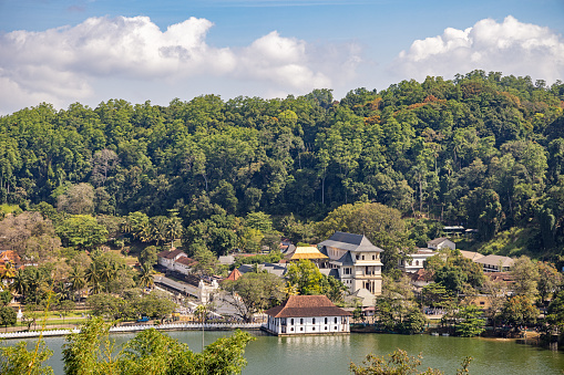 Kandy, Central Province, Province, Sri Lanka - February 25th 2023:  View over Kandy lake and the Temple of the Tooth where one of Buddhas teeth are kept