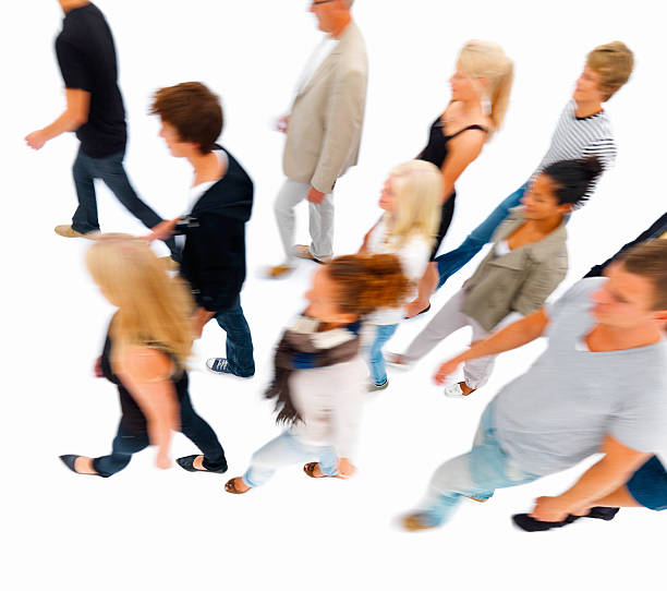 istock Group of people walking against white 149060196
