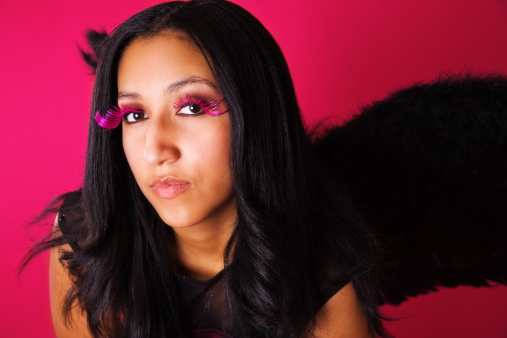 a young African American woman with black wings.