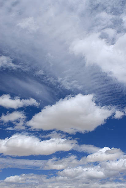 Big blue sky and clouds stock photo