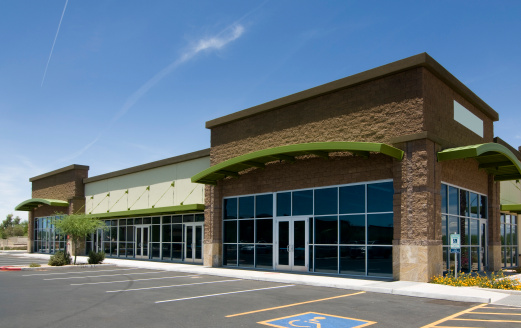 Exterior of new modern retail business architecture located on American strip Mall.