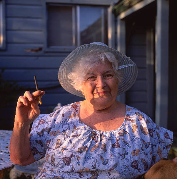 Old southern woman smoking a cigar