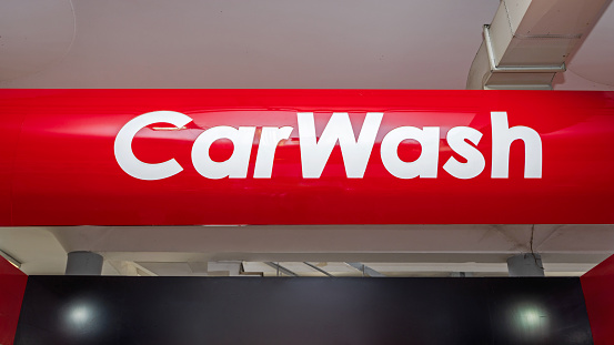 Car Wash Sign White Text at Red Background Automated Tunnel Service Station