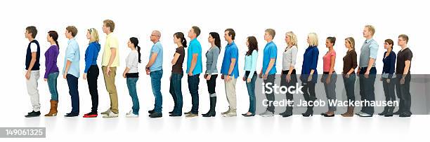 Young Boys And Girls Standing In A Line Stock Photo - Download Image Now - Waiting In Line, People, People In A Row