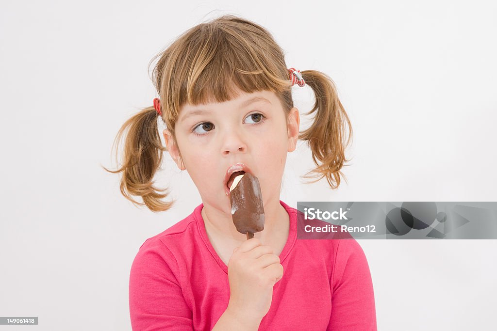 ice cream little girl eating chocolate ice cream lolly Ice Cream Stock Photo