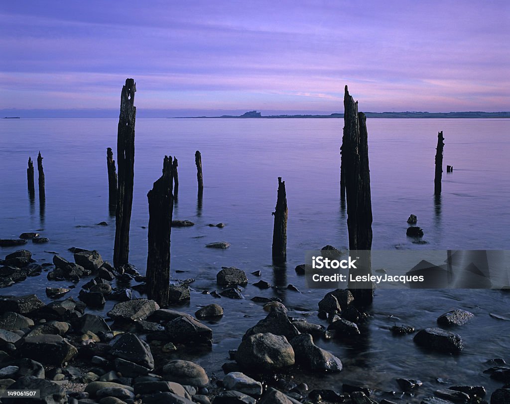 Bamburgh Castle von Lindisfarne jetty - Lizenzfrei Alt Stock-Foto