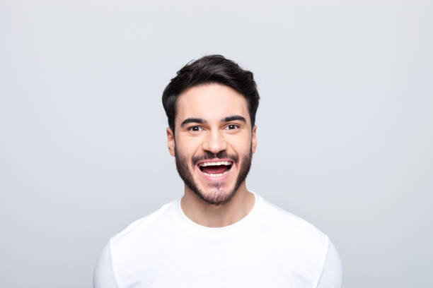 istock Headshot of excited young man 1490615103