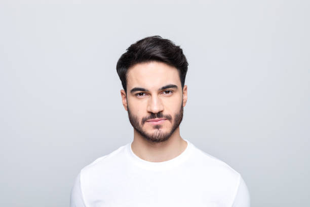 istock Headshot of handsome young man 1490615211