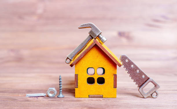 istock Toy House and Hand Tool Replicas with Fasteners 1490616157