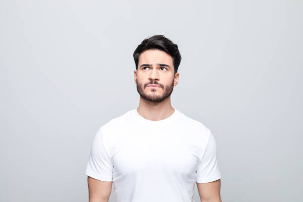 istock Portrait of thoughtful young man 1490616688