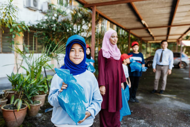 istock School children and students picking up rubbish, plastic waste and participate in environmental protection 1490617363