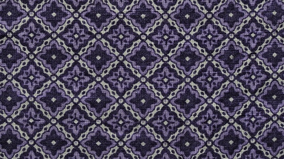 detail of purple white square geometric fabric pattern background