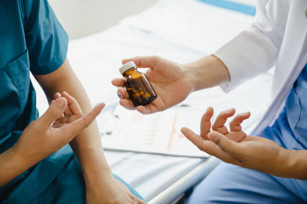 istock Physiotherapist working with patients in clinic, 1490618866