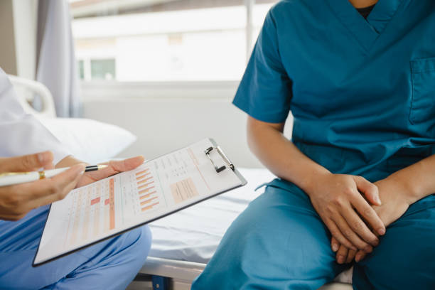 istock Physiotherapist working with patients in clinic, 1490619037