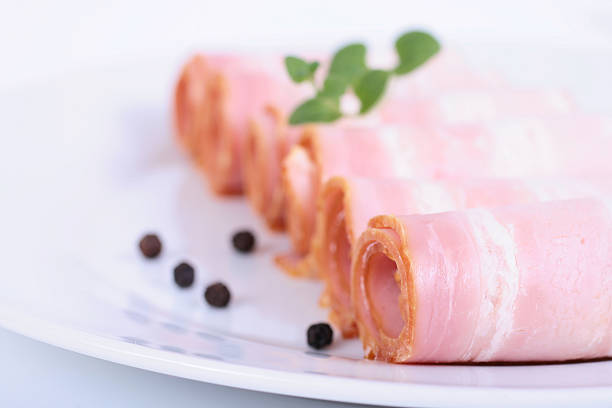 Tasty meat bacon fresh food isolated on a white background stock photo