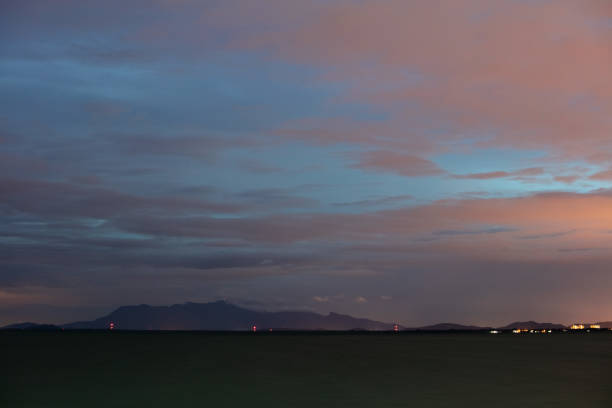 Colourful sunset sky. Full frame view of wispy colourful clouds up in the sky during sunrise or sunset hour. Sky replacement asset.