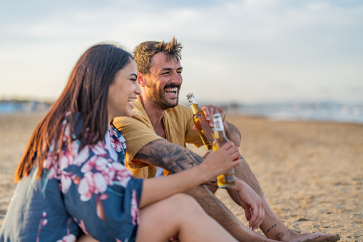 Two friends enjoying their time at the beach