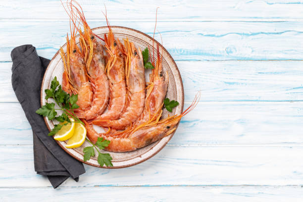 istock Fresh seafood. Plate with langoustines 1490631622