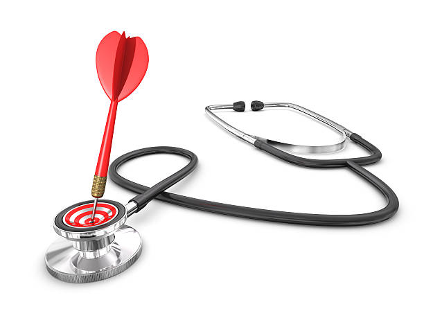Stethoscope with a bulls eye and dart stock photo