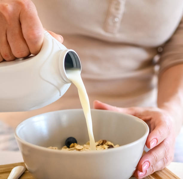 istock Girl preparing morning breakfast with oatmeal 1490633527